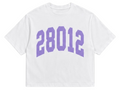 White t-shirt with purple text '28012' on a white background